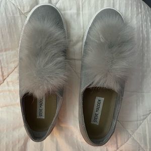 Steve Madden Gray Slip On Sneakers with gray Pom poms, Size 7B.